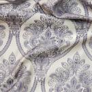 Фото ткань портьерная жаккардовая цвет серо-бежевый с крупным лиловым орнаментом.