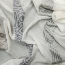 Фото лёгкая портьерная ткань цвет белый с этническим рисунком. 